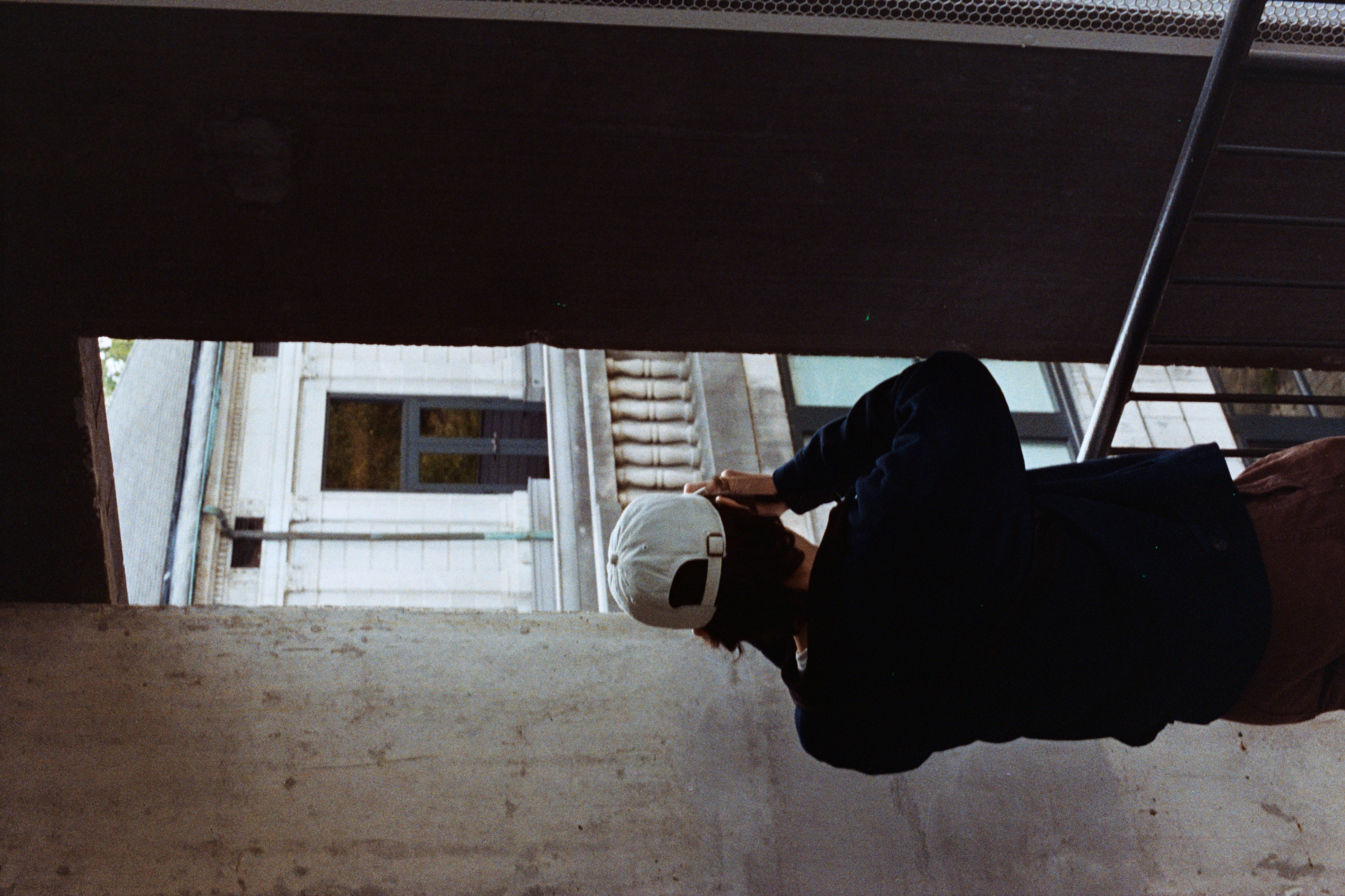 Photographer in window